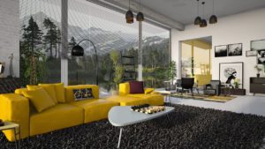 Nowoczesny, duży salon z żółtą sofą i widokiem na góry.